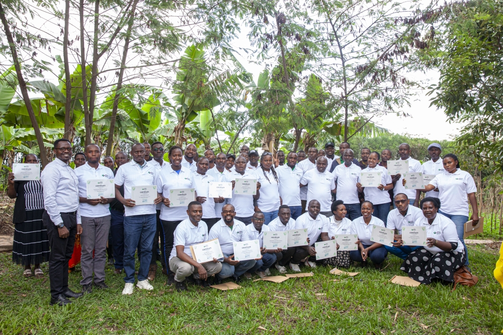 A photo of the closing with trainees holding their certificates (Photo by Prince Emmanuel Mwenimana)