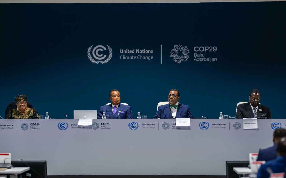 African Development Bank President Akinwumi Adesina, second right, speaks at the Measuring the Green Wealth of Africa event held at COP29 climate change summit in Baku, Azerbaijan.