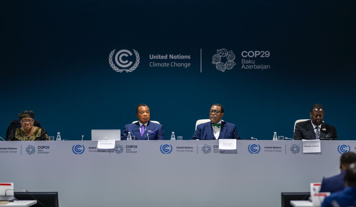 African Development Bank President Akinwumi Adesina, second right, speaks at the Measuring the Green Wealth of Africa event held at COP29 climate change summit in Baku, Azerbaijan.