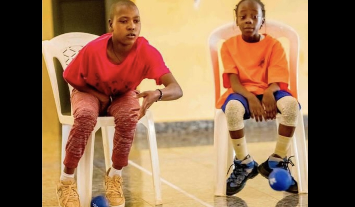 Two children with intellectual disabilities playing Boccia in Bugesera District-courtesy