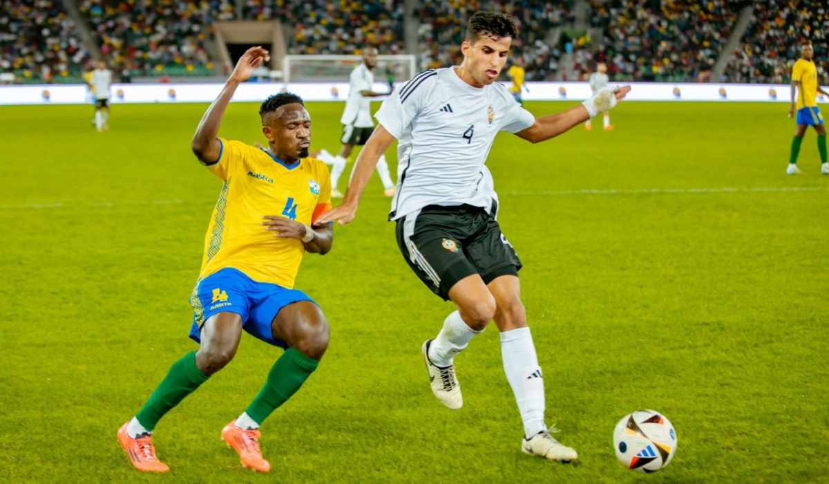 Rwanda captain Djihad Bizimana puts pressure on his Libyan opponent during Thursday’s AFCON 2025 qualifier. The visitors won 1-0 in Kigali to not only dent Rwanda’s qualification hopes but the result also handed Nigeria a ticket to the AFCON 2025 finals-Courtesy