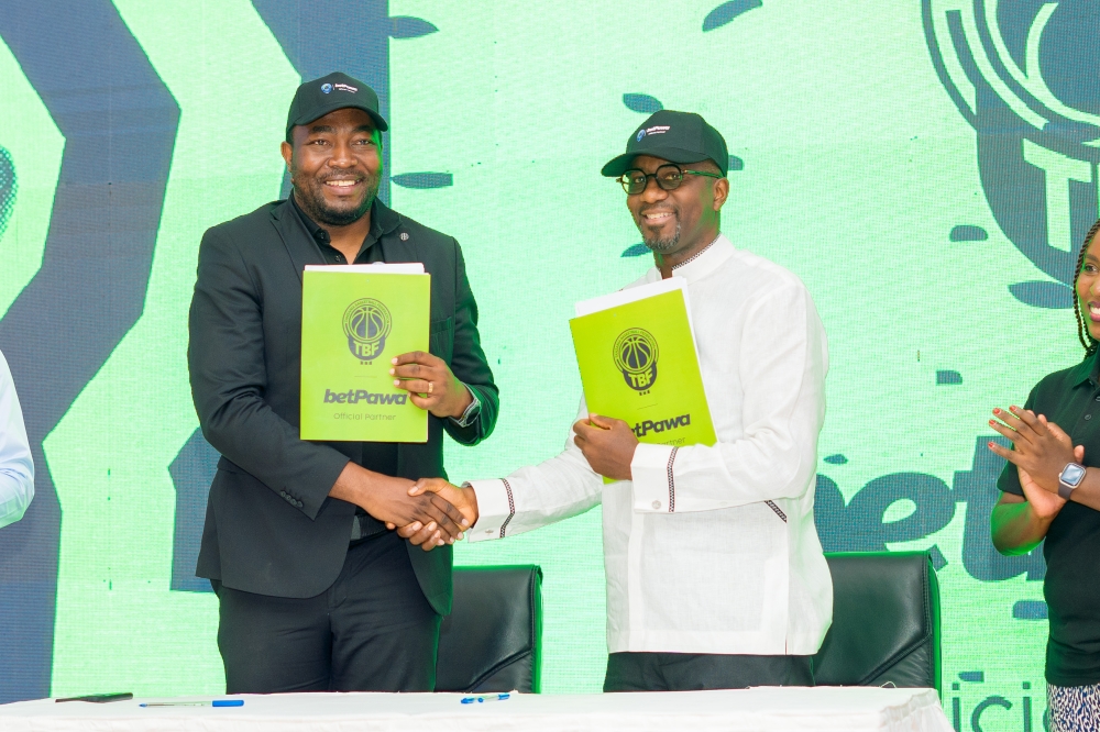 Tanzania Basketball Federation President Michael Kadebe with betPawa&#039;s Chief Commercial Officer Ntoudi Mouyelo at the partnership signing ceremony in Dar es Salaam on Wednesday November 13th.