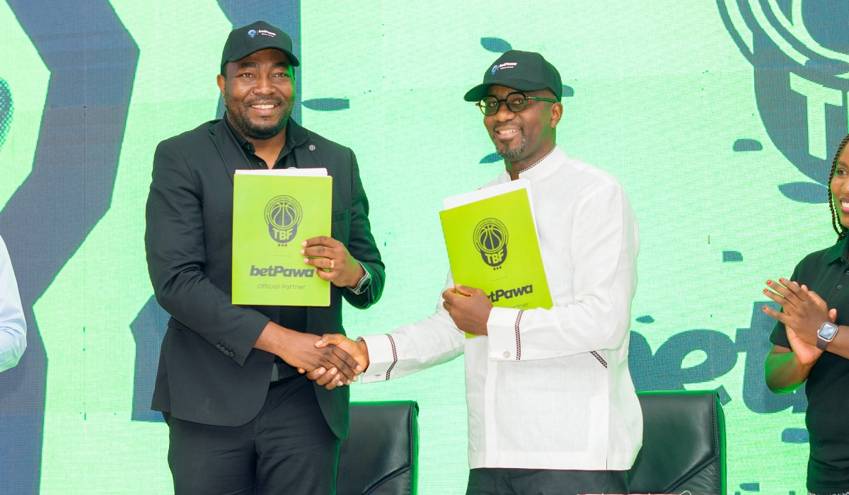 Tanzania Basketball Federation President Michael Kadebe with betPawa&#039;s Chief Commercial Officer Ntoudi Mouyelo at the partnership signing ceremony in Dar es Salaam on Wednesday November 13th.