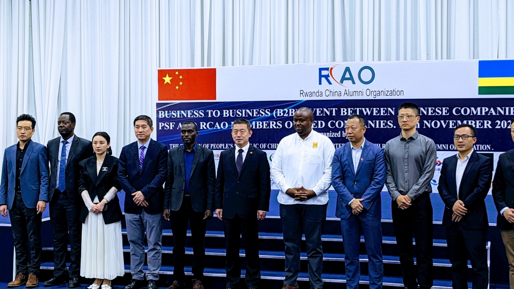 Rwanda China Alumni Organization (RCAO) and Chinese officials  gathered for a group photo during the event held in Kigali on November 16