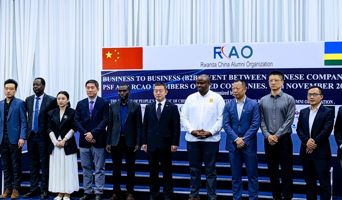 Rwanda China Alumni Organization (RCAO) and Chinese officials  gathered for a group photo during the event held in Kigali on November 16