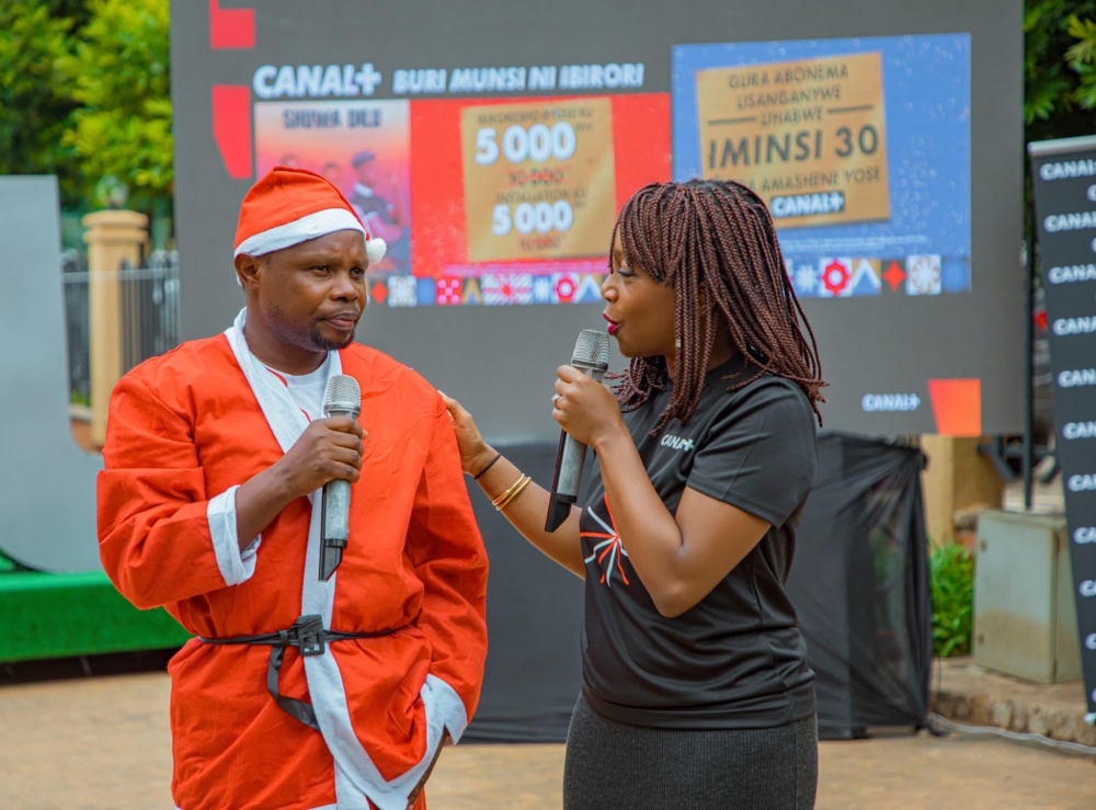 Gratien Niyitegeka, star of Zacu TV&#039;s Shuwa Dilu, and Sophie Tchatchoua, Managing Director of CANAL+ Rwanda, at Imbuga City Walk during the launch of the festive promo Buri Munsi Ni Ibirori on Friday, November 15.