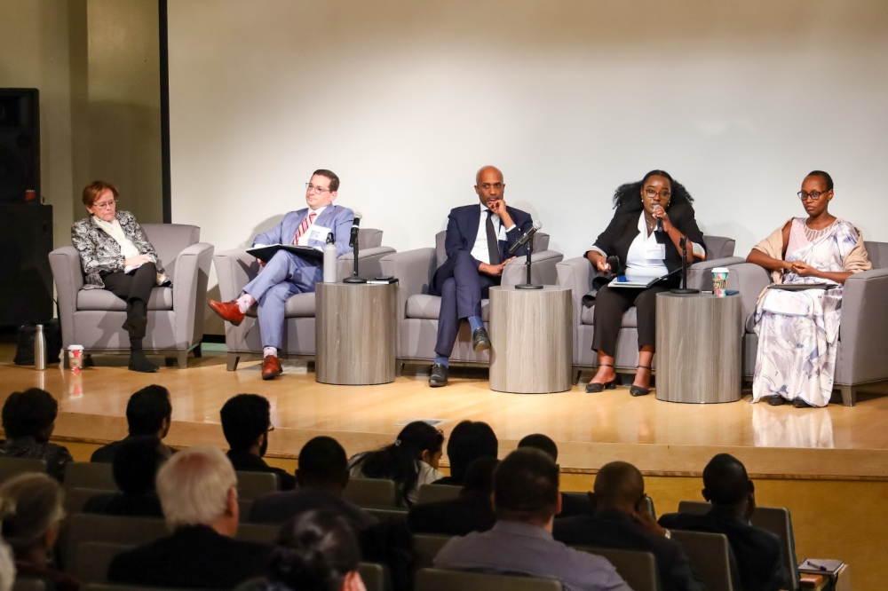 Rwanda&#039;s Minister of Justice, Emmanuel Ugirashebuja (centre), and CEO of the Rwanda Governance Board, Doris Uwicyeza Picard (second right) take part in a panel discussion at the International Conference on Genocide held at California State University, Sacramento on November 14-16. 