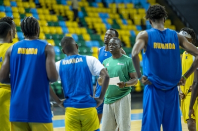 Rwanda’s national basketball team head coach Cheikh Sarr gives instructions to players during the training at Bk Arena on November 17. Photo Courtesy