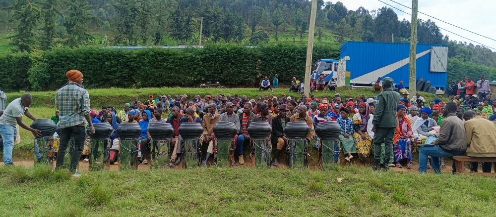 Residents of Burera District receive cookstoves as part of a programme meant to reduce their reliance on firewood from Rugezi wetland. Courtesy