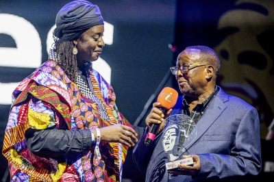 Legendary Rwandan musician Jean Marie Muyango looks excited after receiving the Music In Africa Honorary Award on Monday, November 18-courtesy