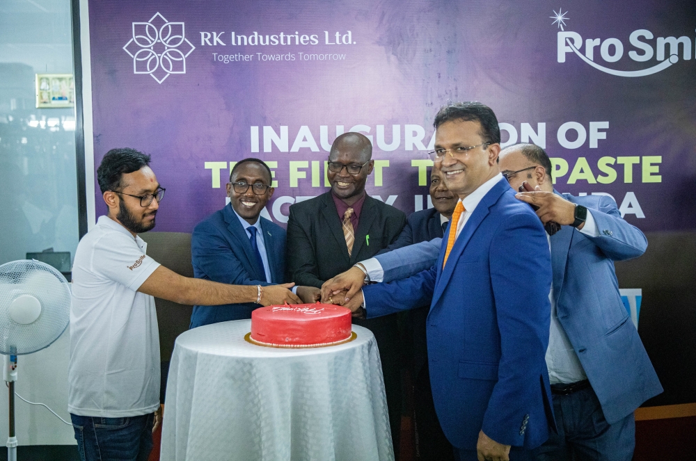 Officials cut a cake as RK Industries inaugurated Rwanda&#039;s first toothpaste factory in the Kigali Special Economic Zone, on November 22. Craish Bahizi