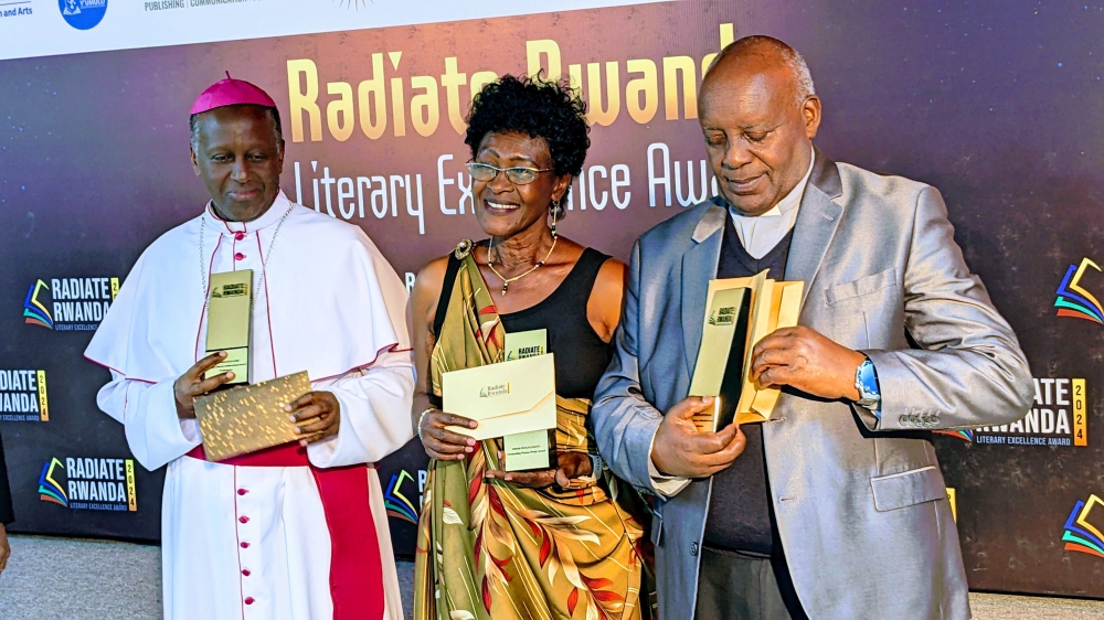 The award for Mgr Alexis Kagame was received on his behalf by Jean Bosco Ntagungira (L) Bishop of Butare Diocese, Author Yolande Mukagasana(C) and Mgr Jean Marie Vianney Nsengumuremyi, Episcopal Vicar of Nyundo Diocese.