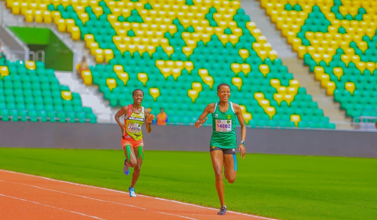 Sina Gerard star Emeline Imanizabayo was all simles after striking gold in the women&#039;s 5,000m event-courtesy