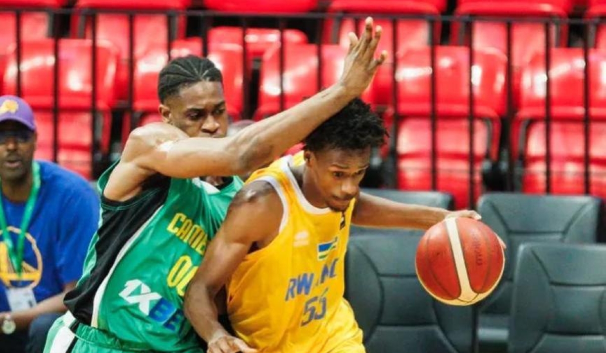 Osborn Shema dribbles under pressure from a Cameroonian opponent during Saturday night&#039;s loss-courtesy