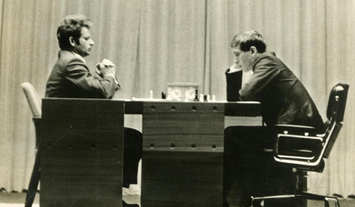 Catching the world’s attention: Boris Spassky, left, faces Bobby Fischer on the stage of Reykjavik’s Exhibition Hall on July 11, 1972. | Photo Credit: THE HINDU ARCHIVES