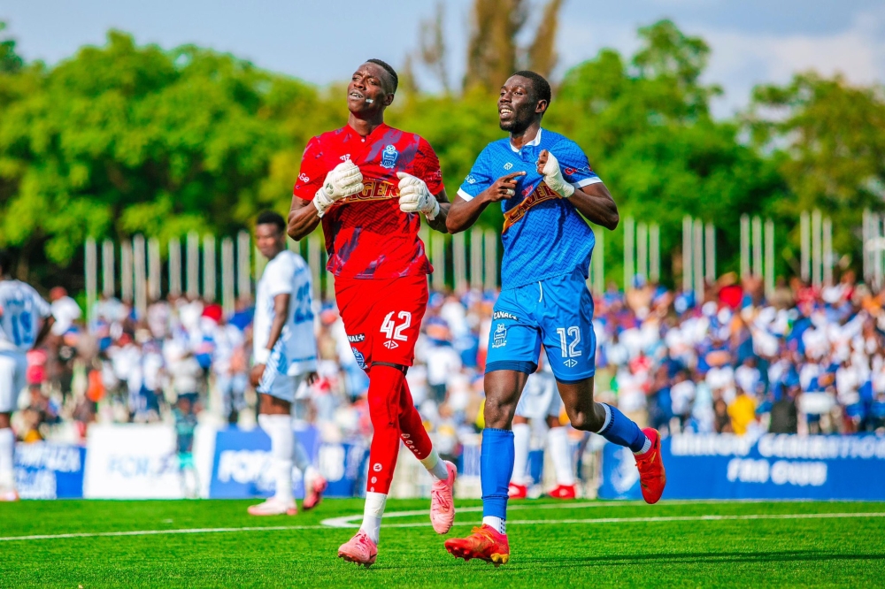 Goalkeeper Khadime Ndiaye (8 clean sheets) and forward Fall Ngagne (4 goals) celebrate after helping Rayon Sports beat Gorilla FC 2-0 on Sunday to make it seven wins in a row-courtesy