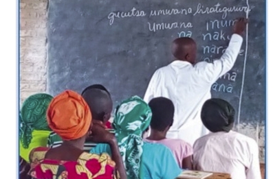 A teacher during a class of adults during a reading session. Rwanda aims to train 710,852 illiterate adults, equipping them with basic reading, counting and writing skills by 2029. File