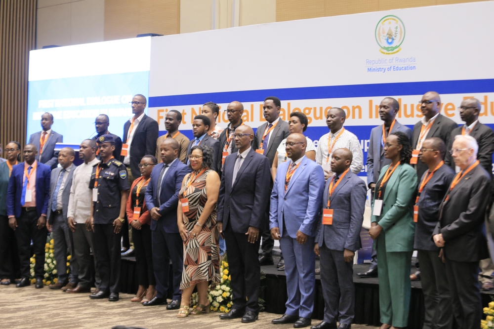 Officials and delegates pose for a group photo