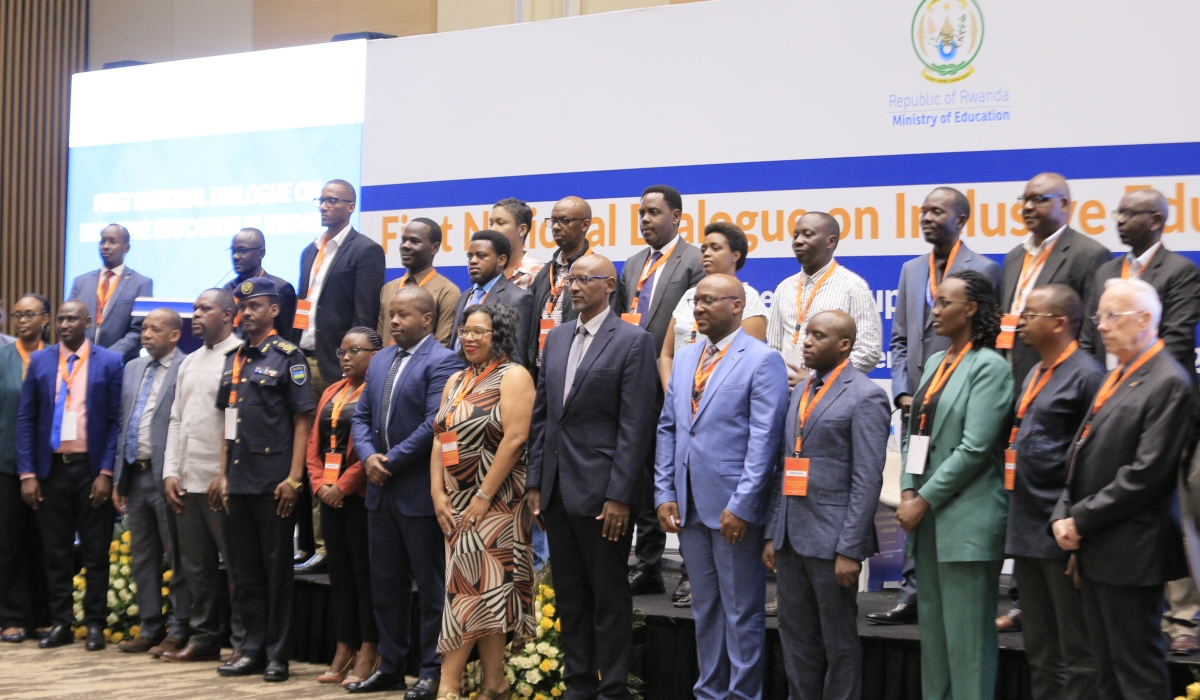 Officials and delegates pose for a group photo