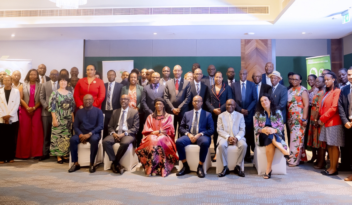 Officials and delegates pose for a group photo  during the launch of  the Country Development Effectiveness Review (CDER) on Thursday, November 28.