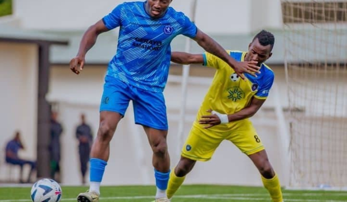 Police FC (Left) striker Elijah Ani shields the ball from Amagaju midfielder Emmanuel Tuyishime during the match.