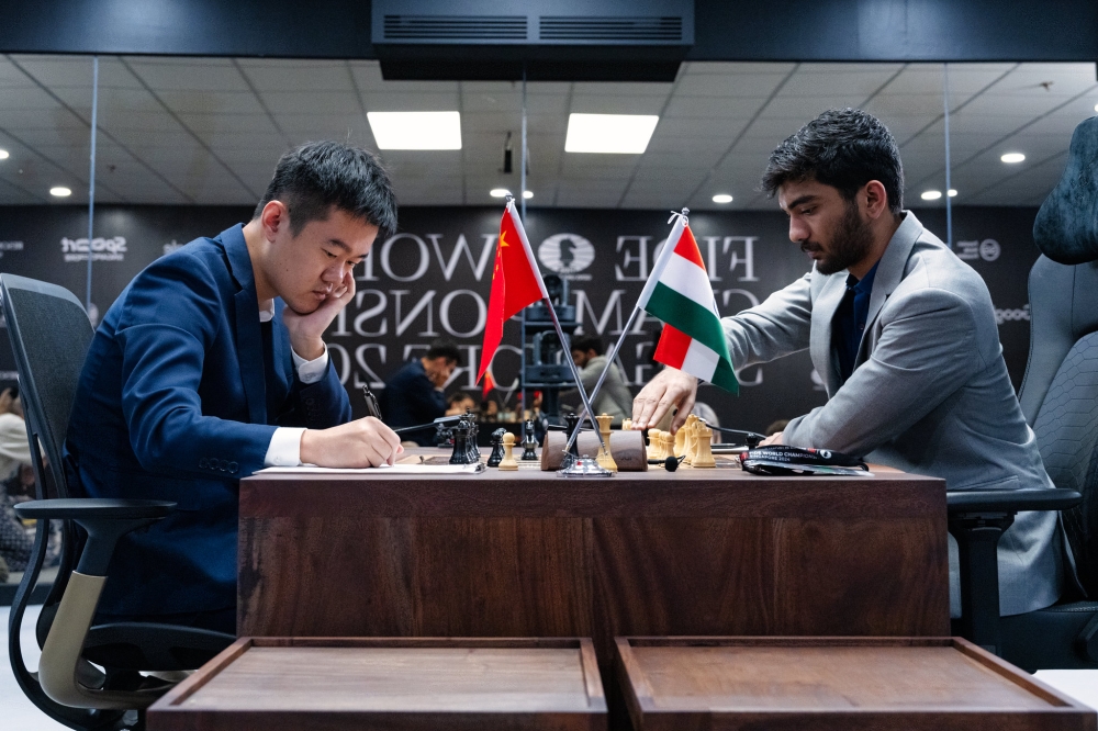 Ding Liren and Gukesh Dommaraju battle it out in game five of the 2024 FIDE World Championship, on Saturday, November 30. Courtesy of FIDE