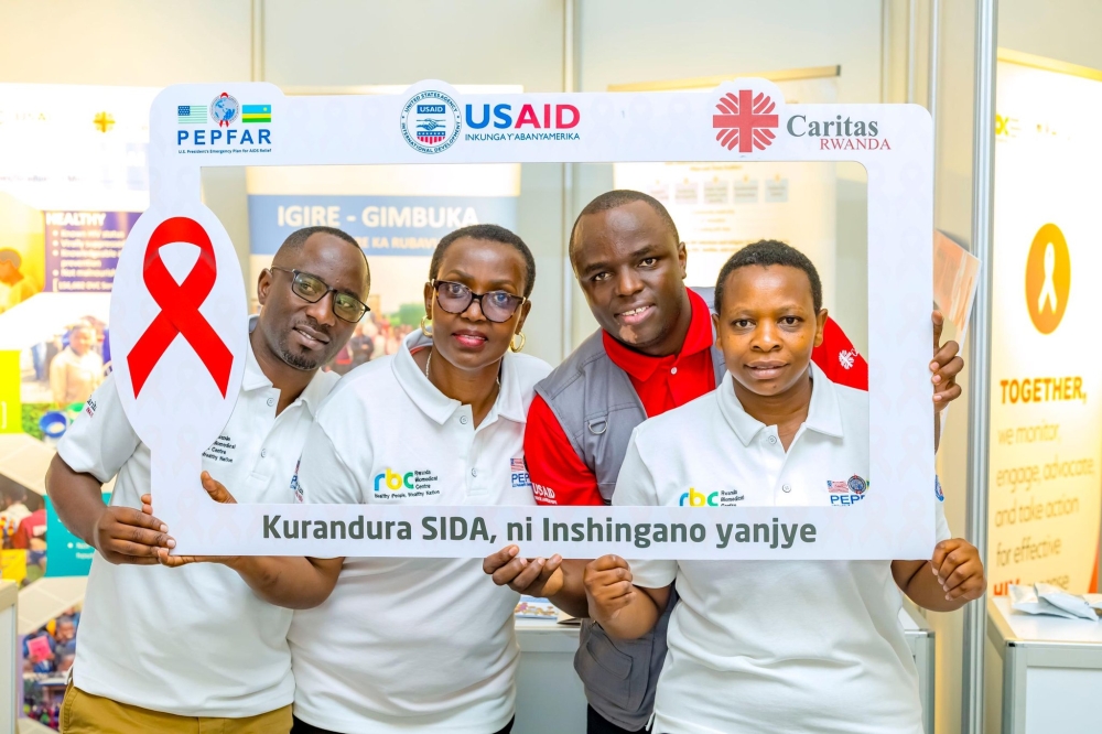 Delegates pose for a photo as Rwanda marked the World AIDS Day event on December 1, under the theme “End AIDS, My Responsibility.” Courtesy