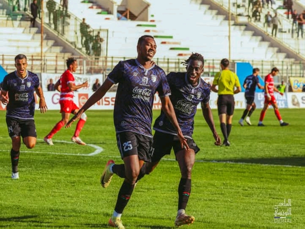 Midfielder Bonheur Mugisha ( #25)  wheela away in celebration after helping Stade Tunisien beat Club Africain 1-0 on Sunday, December 1-courtesy