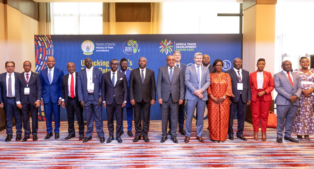 PM Ngirente poses for a photo with delegates at the two-day event in Kigali on Monday, December 2.