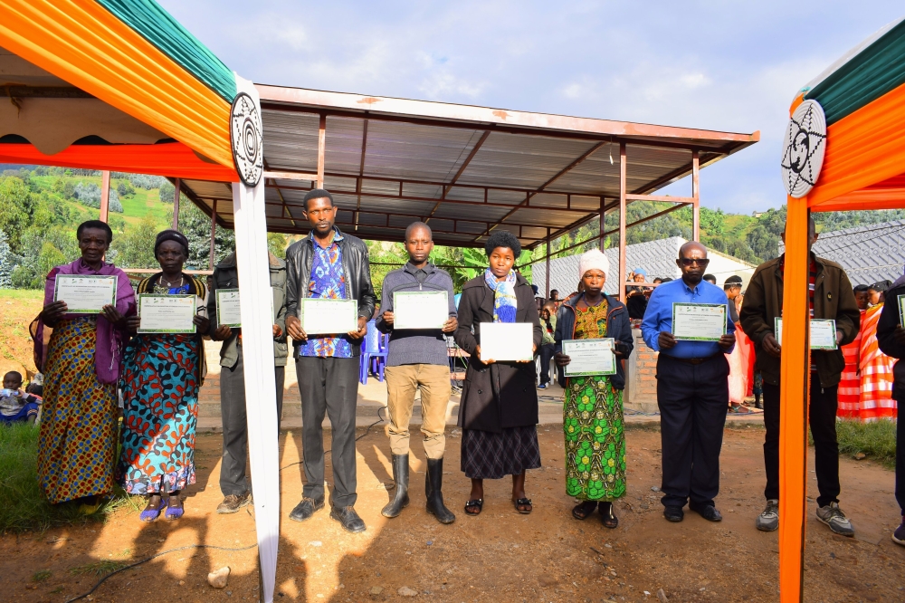 Farmers who were recognized by ICRAF, pose for a photo during the awarding ceremony. Courtesy