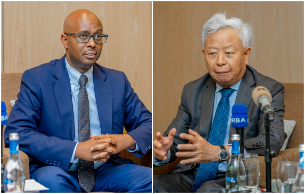 Yusuf Murangwa, the Minister of Finance and Economic Planning; and Jin Liqun, President of the Asian Infrastructure Investment Bank (AIIB) during the joint preconference in Kigali on Tuesday, December 3. Courtesy of MINECOFIN