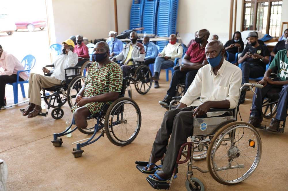 People with disabilities during a meeting at Nyarugunga Sector.  Craish Bahizi