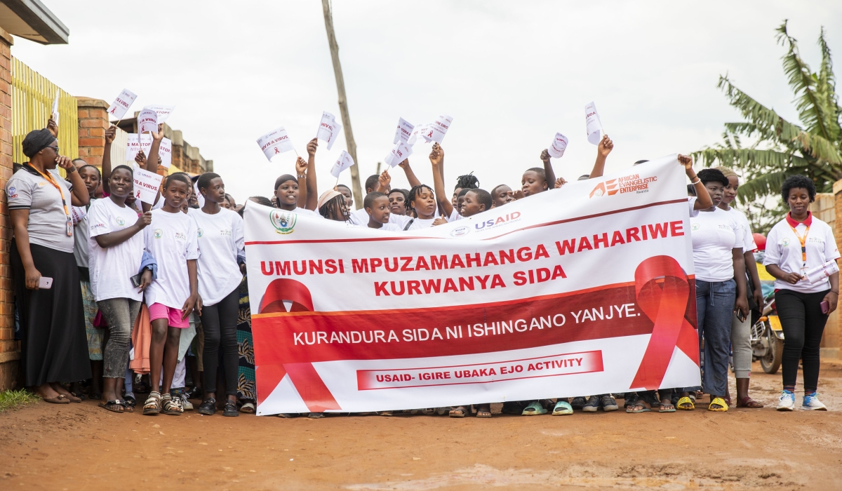 Residents during the campaign as African Evangelistic Enterprise (AEE) Rwanda marked World AIDS Day on December 1  in Ndera Sector, Gasabo District. Photos by Emmanuel Dushimimana