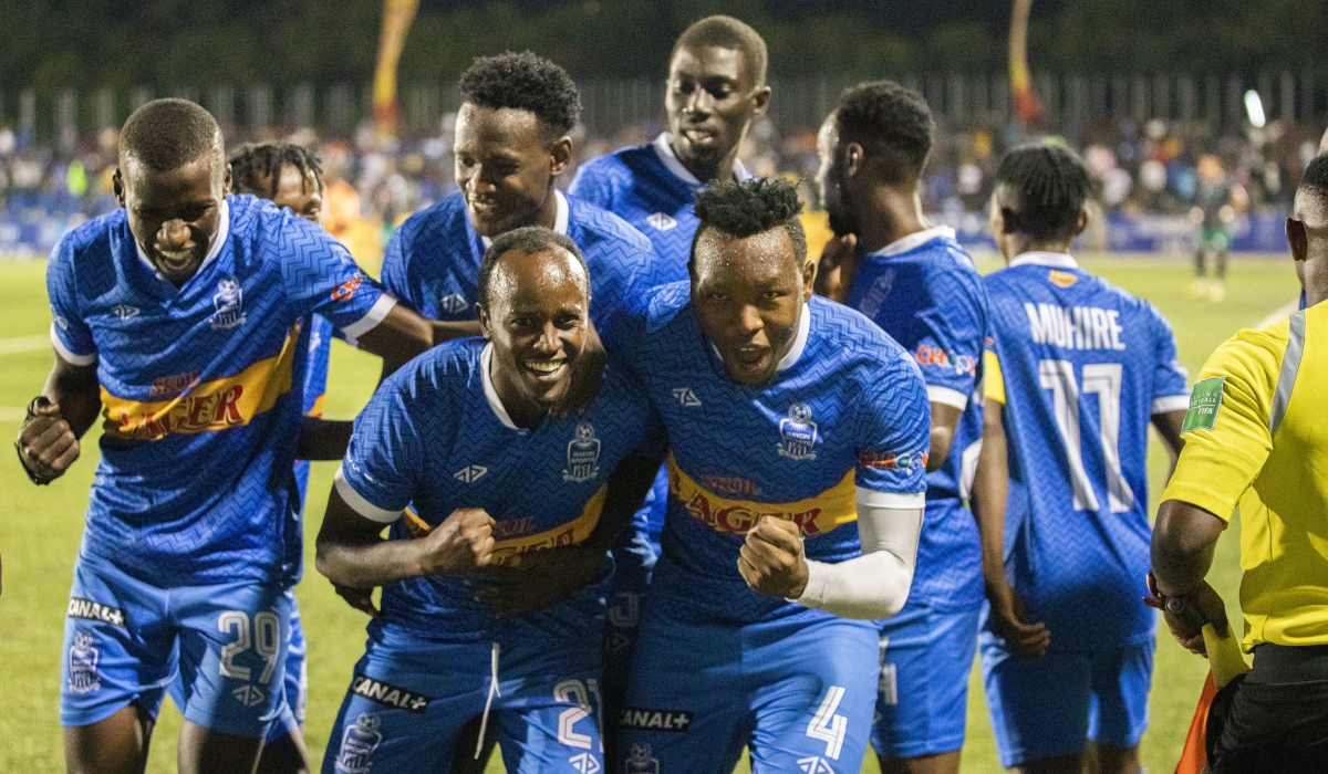 Rayon Sports players join goalscorer Olivier Niyonzima in celebration after scoring in club&#039;s 2-1 win over Muhazi United at Kigali Stadium on Wednesday, December 4-Photo by Emmanuel Dushimimana