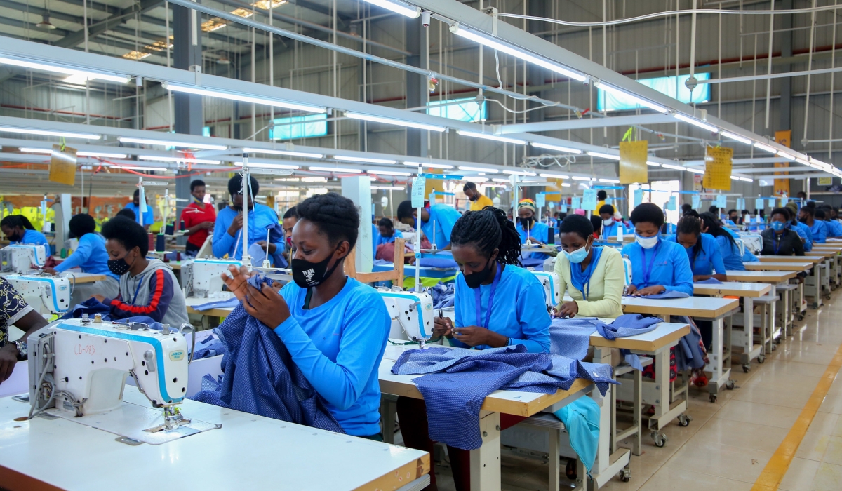 Workers on duty at Pink Mango garment factory in Kigali Special Economic Zone. Photo by Craish Bahizi