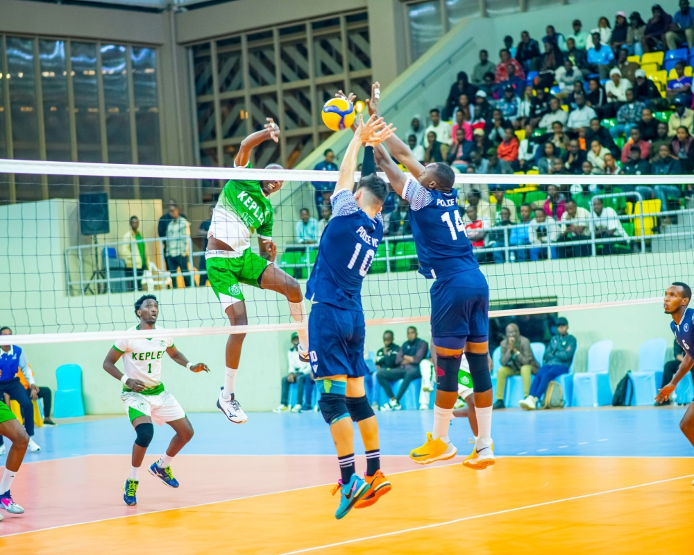 Police VC players block a ball from Kepler VC on Friday, December 6, in a game in which they triumphed on 3-1 sets.