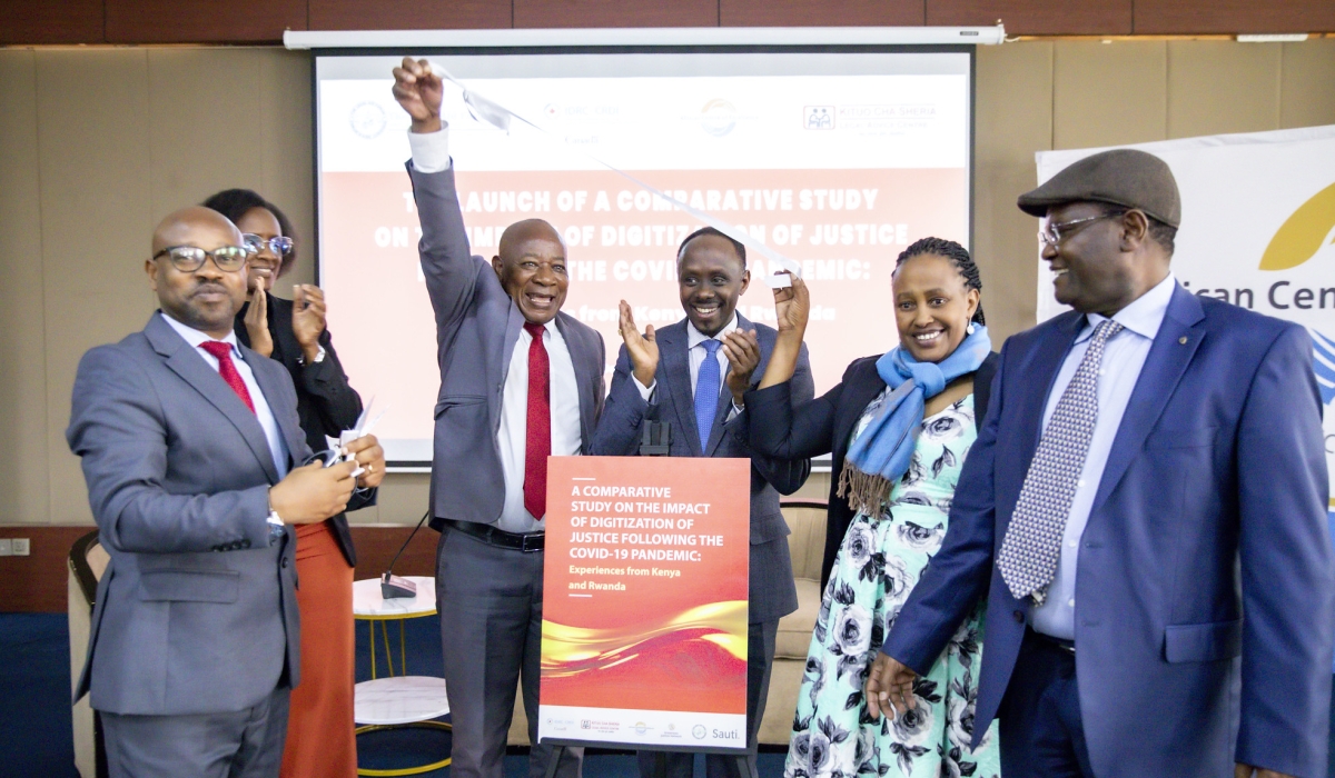 Officials launch a report, titled “A Comparative Study on Digitization of Justice following COVID-19 in Kenya and Rwanda,”  on December 5 in Kigali. Photos by Emmanuel Dushimimana