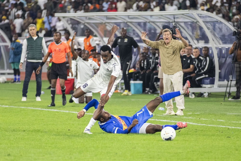 Rayon Sports head coach Robertinho shouts instructions to his players as APR&#039;s Darko Novic watches on during Saturday&#039;s goalless draw with APR FC-Emmanuel Dushimimana