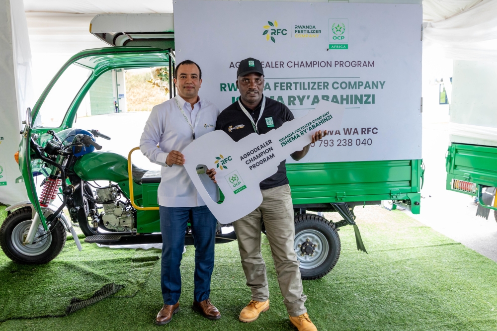 RFC&#039;s Managing Director, Anass Khanchoufi hands over a  brand-new motor tricycles to one  of agro-dealers and farmers who play a vital role in strengthening Rwanda’s food system. As part of the RFC Agro-dealer Champion Program 2024, the top three agro-dealers were awarded brand-new motor tricycles. All photos by Craish BAHIZI