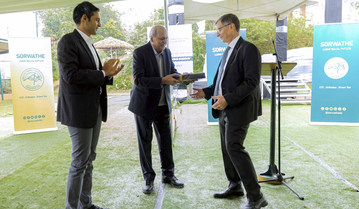 (L-R) Rudra Chatterjee, Chairman of Silverback Tea Company and Managing Director of SORWATE LUXIMI TEA Co. PVT LTD, his  Father Dipankar Chatterjee, Chairman of Luxmi Tea Co. Pvt. Ltd and Andrew Wertheim, Chairman at the handover ceremony at Sorwathe Ltd in Kinihira Sector, Rulindo District, Northern Province on December 5. Courtesy