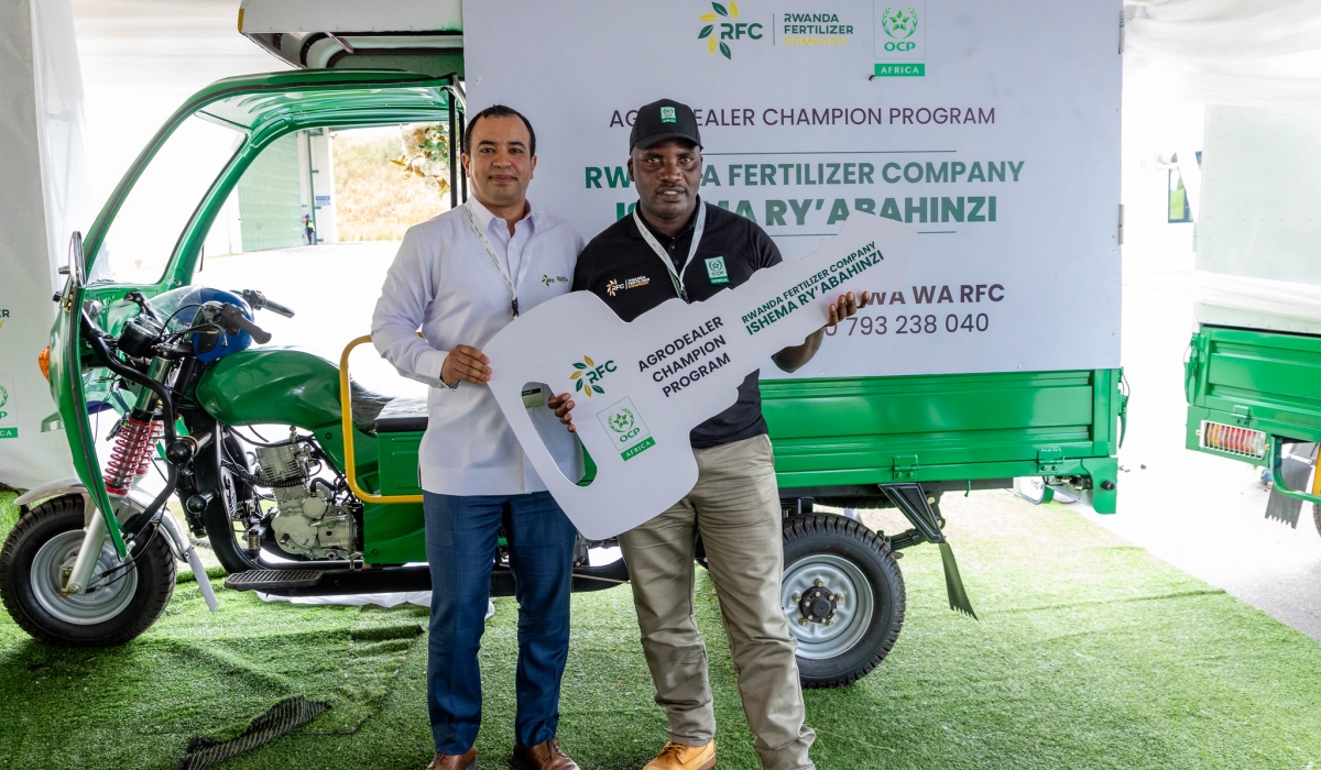 RFC&#039;s Managing Director, Anass Khanchoufi hands over a  brand-new motor tricycles to one  of agro-dealers and farmers who play a vital role in strengthening Rwanda’s food system. As part of the RFC Agro-dealer Champion Program 2024, the top three agro-dealers were awarded brand-new motor tricycles. All photos by Craish BAHIZI