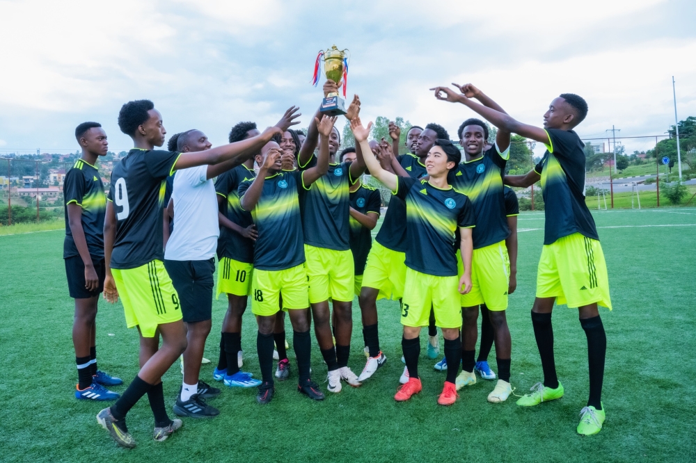 Players lift up a  trophy at Green Hills Academy.