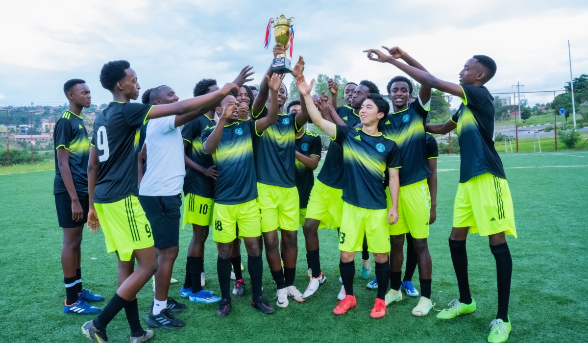 Players lift up a  trophy at Green Hills Academy.