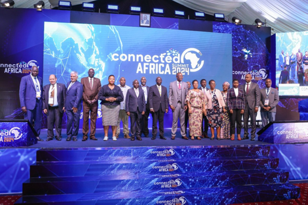 Officials pose for a group photo at the Connected Africa Summit 2024 in Nairobi. Internet