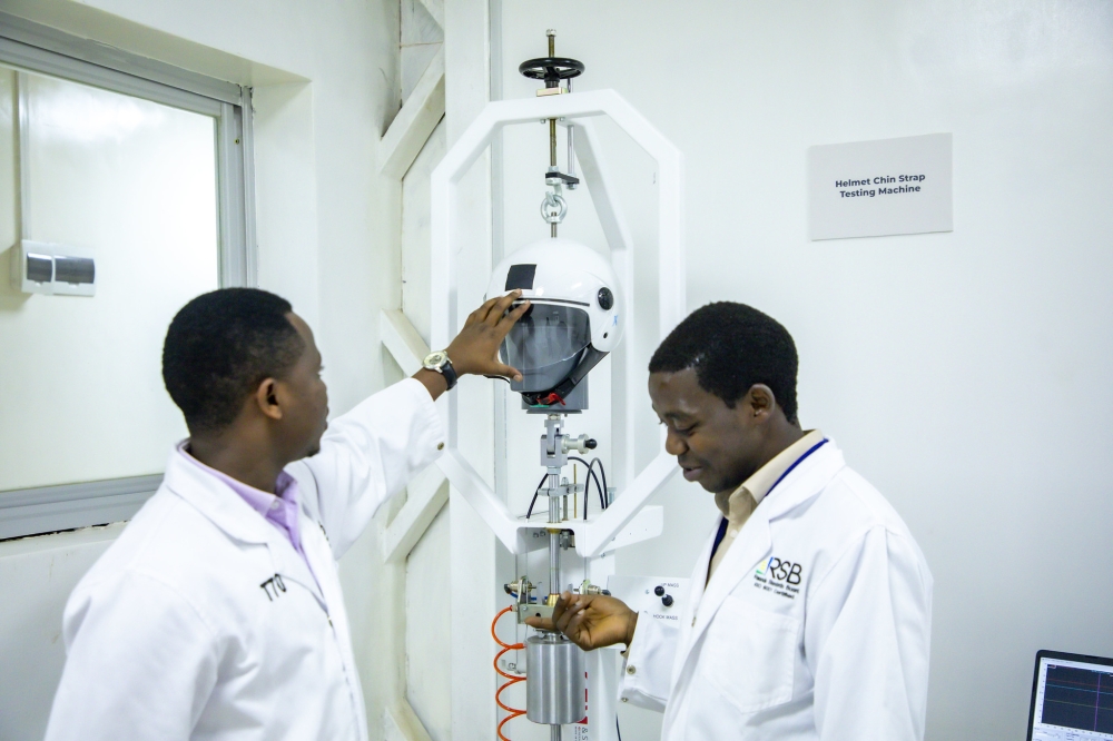 Lab technicians test one of the helmets during the official launch of the facility on Wednesday, December 12. The facility can test 30 to 40 helmets per day. All photos by Emmanuel Dushimimana