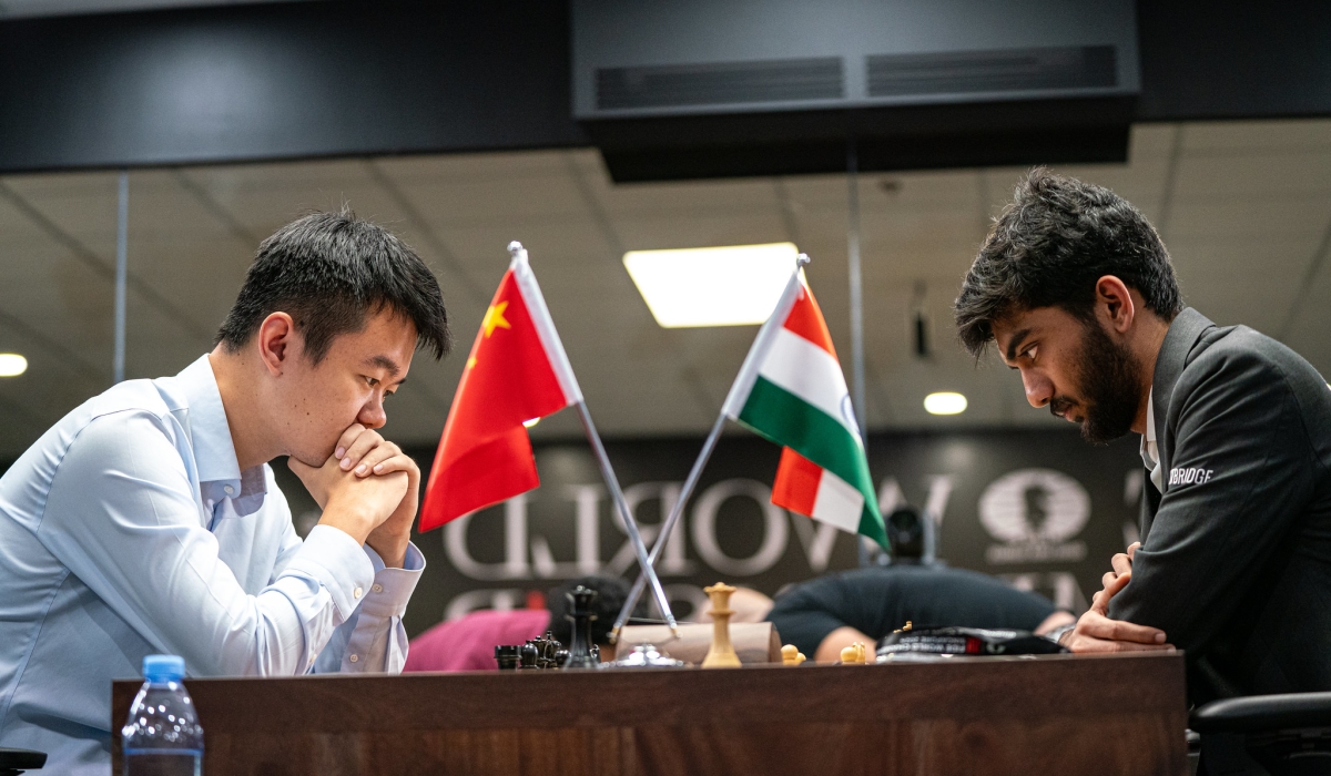 World Champion GM Ding Liren (left) and India’s GM Gukesh Dommaraju (right), during Game 13 of the 2024 FIDE World Championship match at Singapore&#039;s Equarius Hotel in Resorts World Sentosa, on Wednesday, December 11. Courtesy of FIDE