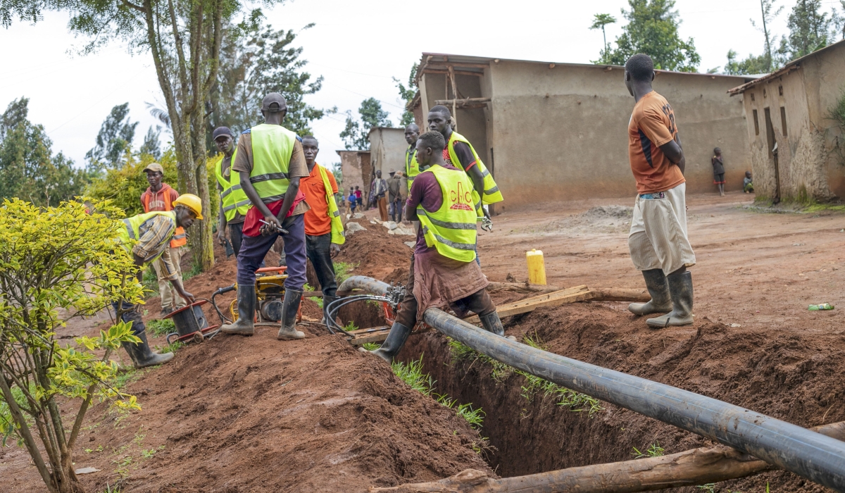 Workers install water pipelines in water supply projects that will enable the distribution of clean water to remote areas in Gatsibo.