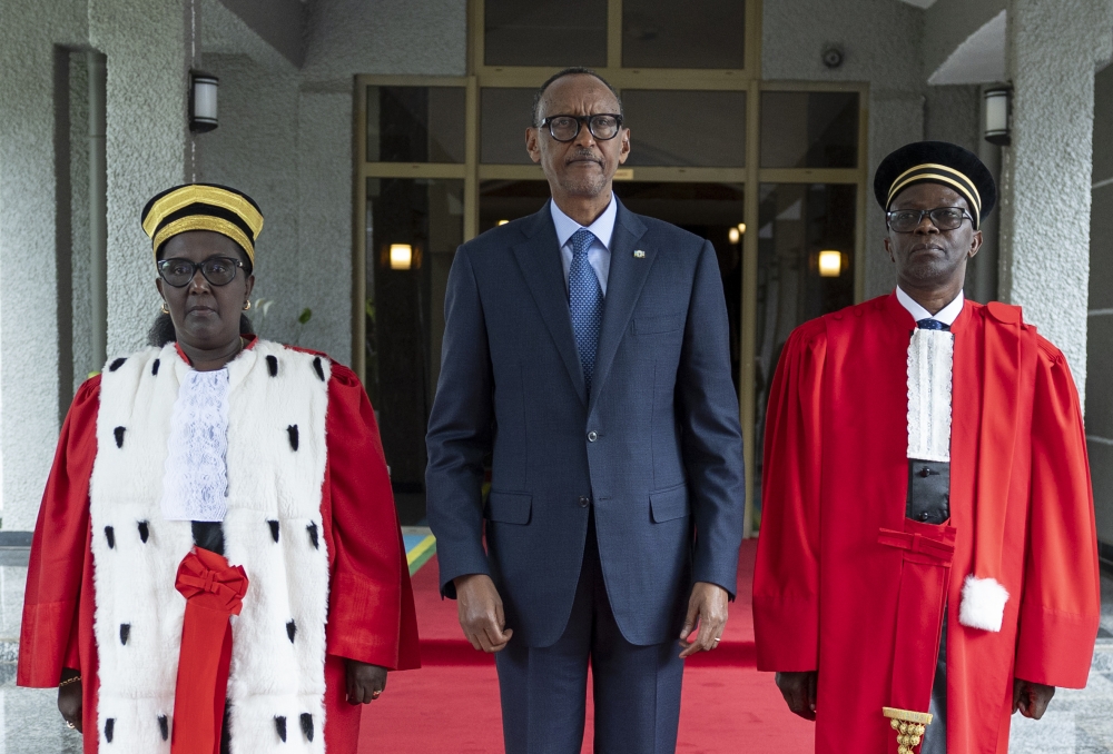 President Paul Kagame poses with new Chief Justice Domitilla Mukantaganzwa and her deputy Alphonse Hitiyaremye at the swearing-in ceremony in Kigali on Thursday, December 12. In his remarks, Kagame tasked the new Chief Justice to dispense justice without exception. Photos by Emmanuel Dushimimana