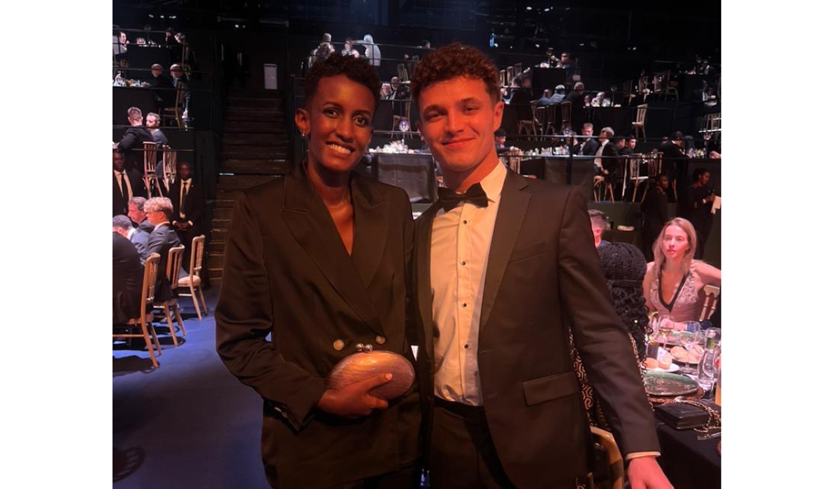 Rwandan Rally driver Queen Kalimpinya poses for a photo with British Formula One star Lando Norris-courtesy