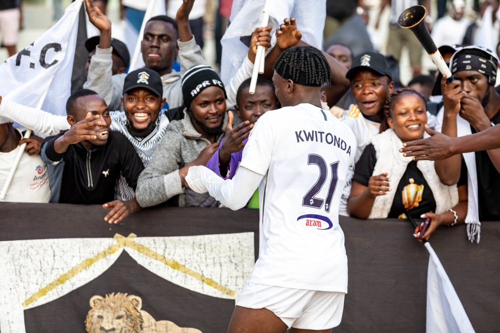 APR FC&#039;s Alain Bacca Kwitonda cheers on supporters in celebration of his screamer that completed club&#039;s 4-2  comeback against Mukura VS at Kigali Pele Stadium on Saturday. All photos by Craish BAHIZI